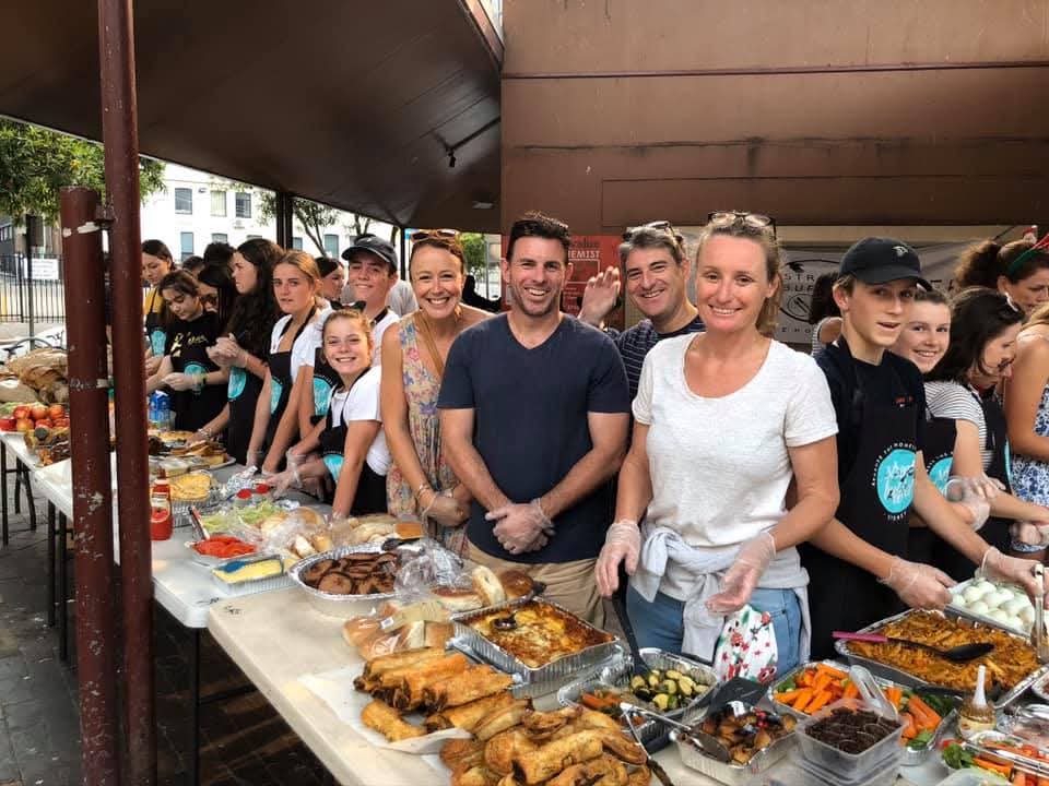 Ian Schaffa, far left, with his team collecting a bread donation
